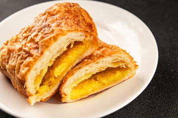Triangle cake almond puff pastry sweet dessert fresh delicious gourmet food background on the table rustic food top view copy space