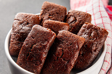 Biscuit Financier chocolate cookie sweet dessert fresh delicious gourmet food background on the table rustic food top view copy space