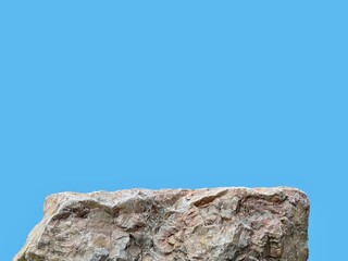 Stone podium rock stand isolated on cyan background with clipping path for product display presentation backdrop.
