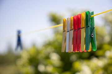 Close-Up of Colorful Clothespins on a Clothesline Outdoors