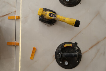 flooring machine and parts used for leveling and spacing floors
