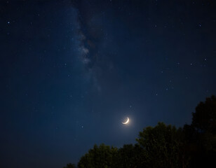 A magical night sky with glowing stars and a crescent moon, ample copy space, moon and stars