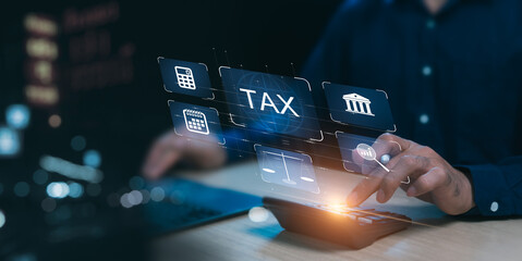 Online tax planning concept, Finance that must be deducted to the government, Man using a laptop to enter calculation data to report income to the Revenue Department, to pay taxes as required by law