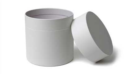 Open white cylinder cardboard box and its lid isolated on white background, creating a clean and minimalist presentation for packaging or storage concepts