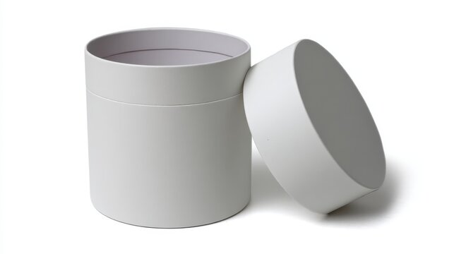 Open white cylinder cardboard box and its lid isolated on white background, creating a clean and minimalist presentation for packaging or storage concepts