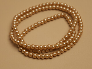 Strings of pearls or beads 