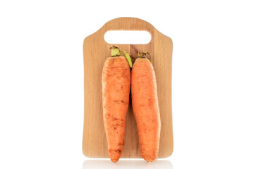 Organic carrots isolated on white background, macro.