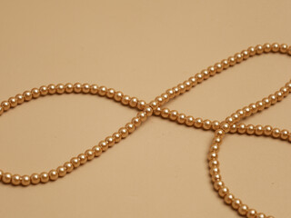 Strings of pearls or beads 