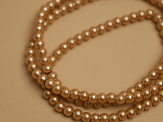 Strings of pearls or beads 