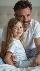 Fototapeta premium Joyful father and daughter sharing a tender moment