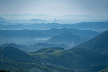 landscape of mountain with fog at morning