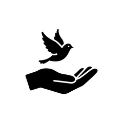Hand Releasing Small Bird for Freedom and Peace