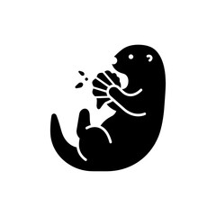 Sea Otter Cracking Shell on Its Chest in Natural Coastal Habitat