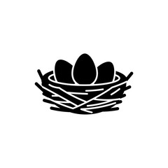 Bird nest containing three eggs resting naturally in tree branches