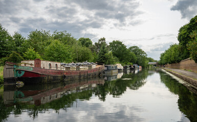 Hanwell, Greater London, UK: Old boats on the Grand Union Canal near Hanwell in London.