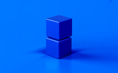 Obraz premium Two blue cubes stacked on blue background