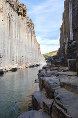 Nestled in the heart of Iceland, Studlagil Canyon captivates with its towering basalt columns and...