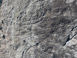 Cave carvings of a boat 