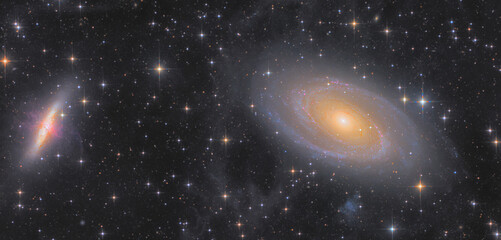 dreamy, colorful deep sky photography of two galaxies and some faint nebulas
