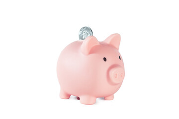 Pink piggy bank with coin isolated on white background. Concept of money saving.