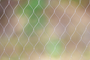 Fototapeta premium Fishing Net Close-up – Abstract Depth and Texture