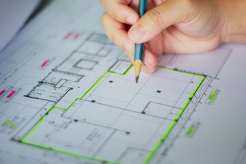 Professional Civil Engineer Inspecting Structural Blueprint