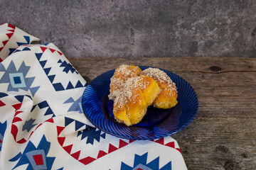 Romanian mucenici from Moldova region: figure eight shaped sweet bread, sprinkled with honey and...