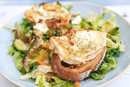 Close up image of warm goat cheese salad