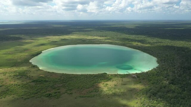 Aerial view of Kaan Luum lagoon, a beautiful hidden gem near Bacalar, Mexico, showcasing its stunning turquoise waters