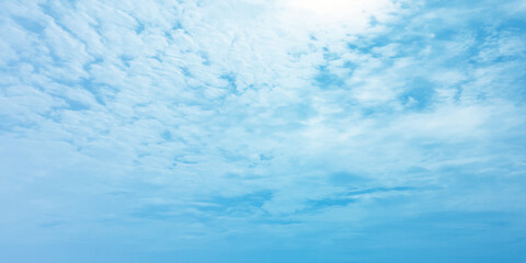 Daylight blue soft clouds, light sunny effect on the blooming white background, sunlight spots on the natural, beautiful spring season clear fresh mind change banner use wallpaper 