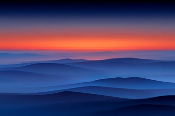Blue mountains under a fiery sunset