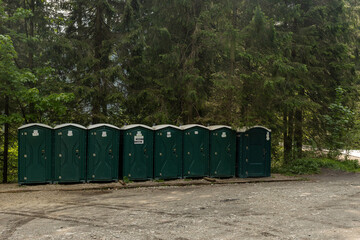 Portable public free toilets along the hiking route to Morskie Oko in Tatra Mountains near Zakopane, Poland, serving tourists on a busy mountain trail in Tatra National Park © Point of view