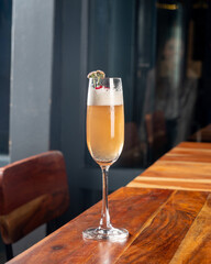 Champagne based cocktail in a champagne Tulip glass