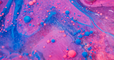 Paint substance. Acrylic blob. Pink blue mix oil liquid flow. Shimmering colorful art bubble emulsion stream blur abstract background.