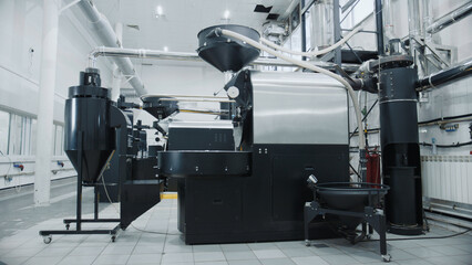 Coffee roasting machine operating in modern
