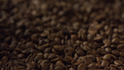 Roasted coffee beans forming a textured brown