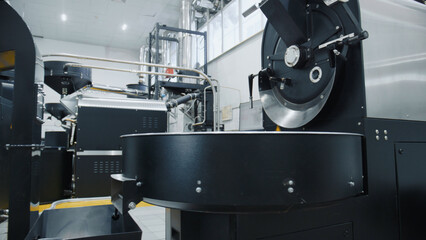 Coffee roasting machine processing coffee beans in