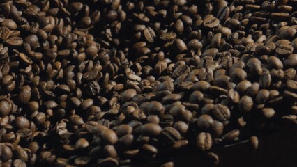 Roasted coffee beans rotating in a coffee roaster
