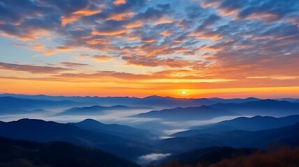 Fototapeta premium A bright golden sunrise breaking over the Carpathian range, vivid orange and yellow clouds glowing against a fading deep blue sky, mountains in dark silhouette, soft mist on the horizon.
