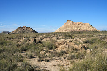 Rock sandstone and clay formations in the half desert of Bardenas Reales in the Navarra province of Spain