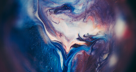 Shiny blend. Blur paint water. Blue orange purple color sparkling liquid stream leak in defocused...