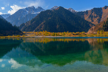 Picturesque mountain lake Issyk in the outskirts of the Kazakh city of Almaty on an autumn morning