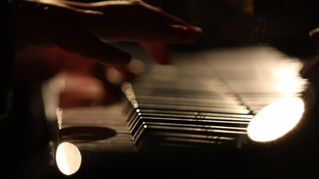 a top-down view of a pianist playing under a spotlight, and an intimate, silhouetted close-up of hands on the keys with beautiful bokeh.