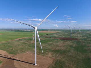Aerial view of wind turbines on the prairies in central, Alberta near Lomond.