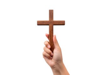 Hand holding wooden cross against on transparent background, PNG