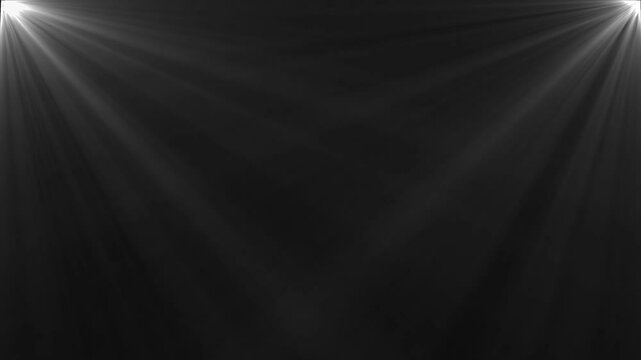 flashlight beams moving in total darkness on background 4k flashlight beam moving left and right into total darkness on black screen. Bright white spotlights rays of professional lighting equipment.