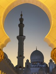 Minaret of the Sheikh Zayid Mosque at sunset.
