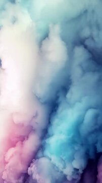 Slow-motion vertical video of soft, colorful clouds with pink, blue, and white hues. Perfect for cheerful story backgrounds, nature themes, or dreamy digital art.