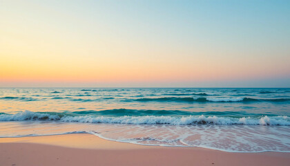 Obraz premium Serene coastal sunrise scene featuring tranquil ocean waves gently lapping a pristine sandy beach under a soft pastel sky ideal for travel websites or calming backgrounds