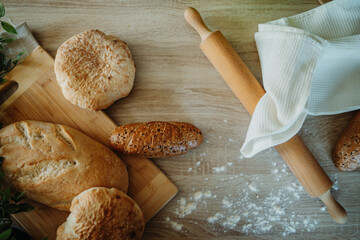 Top view of rolling pin bread and bakery products 